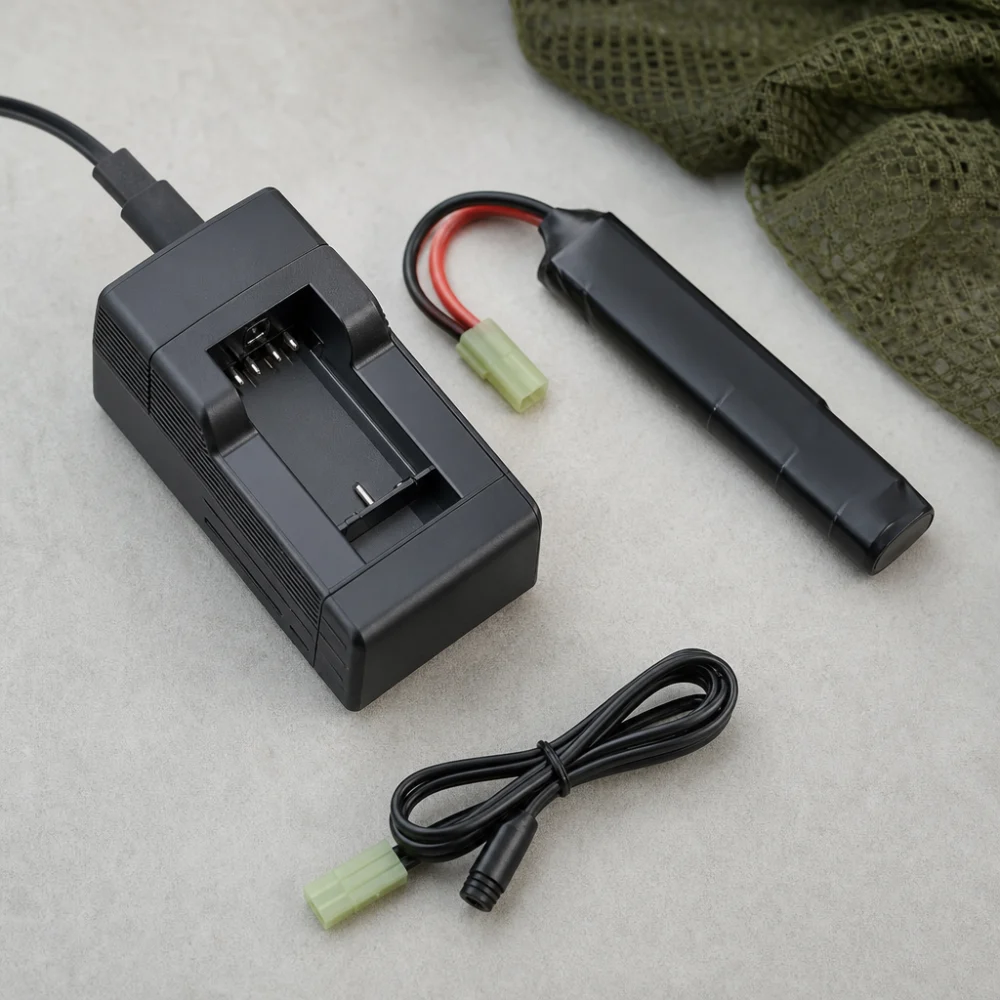 Airsoft battery charger with a battery pack and cable on a neutral background