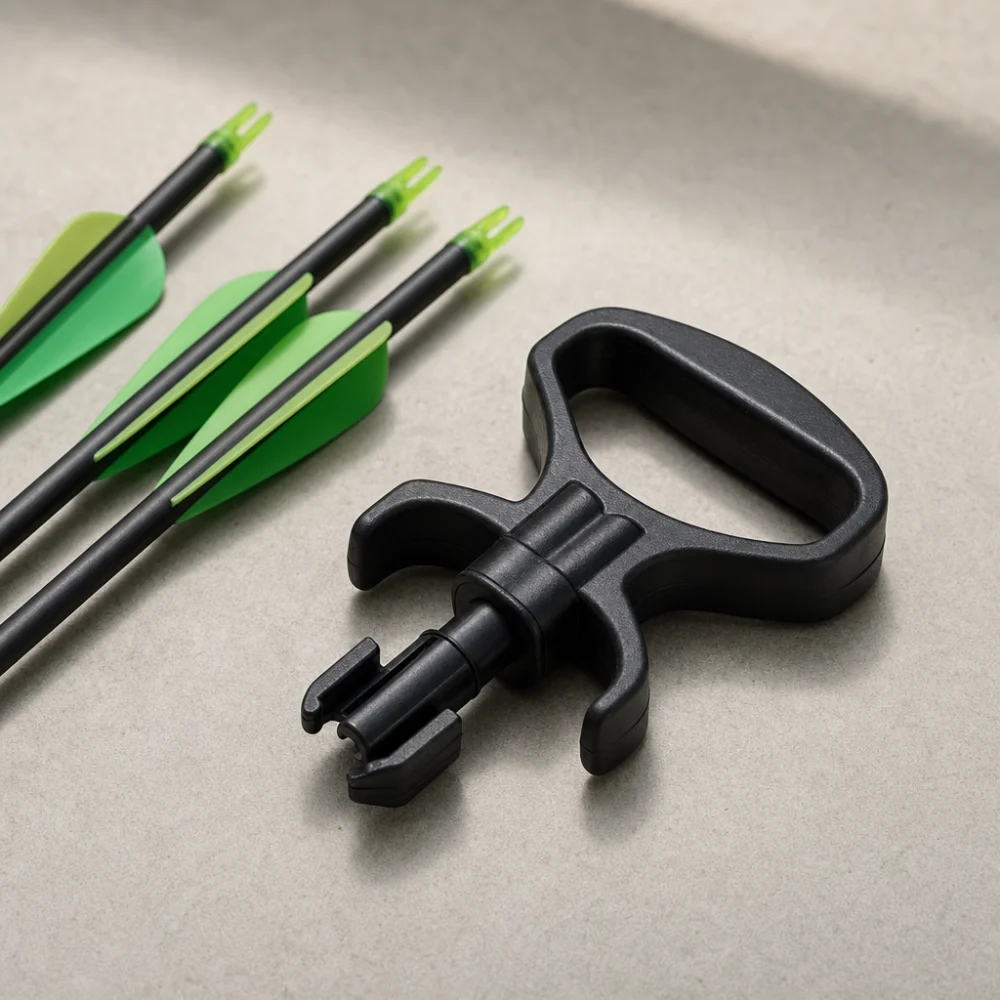 A generic arrow puller shown beside unbranded archery arrows on a neutral background.