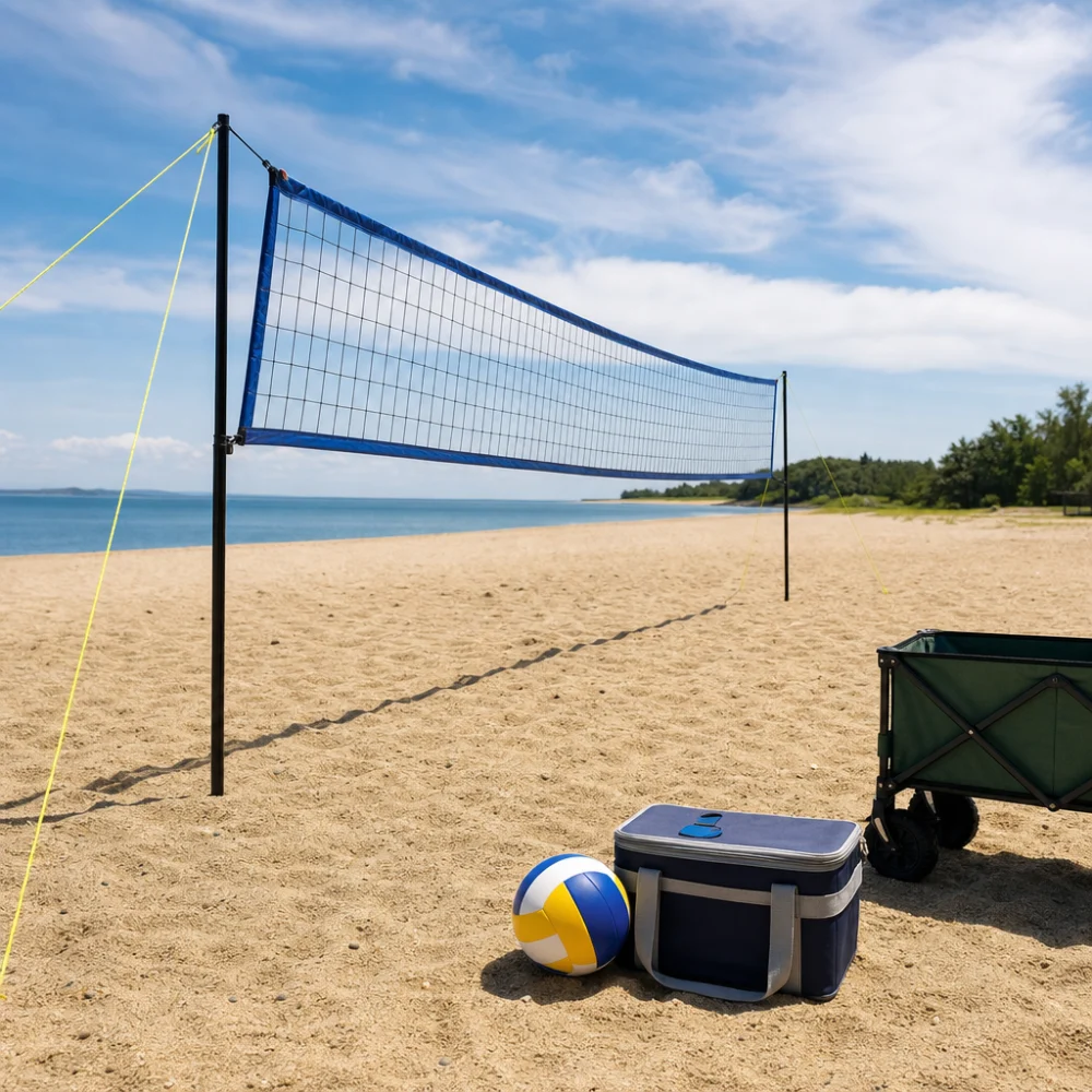 A beach volleyball net set up on sand with simple recreational gear nearby.