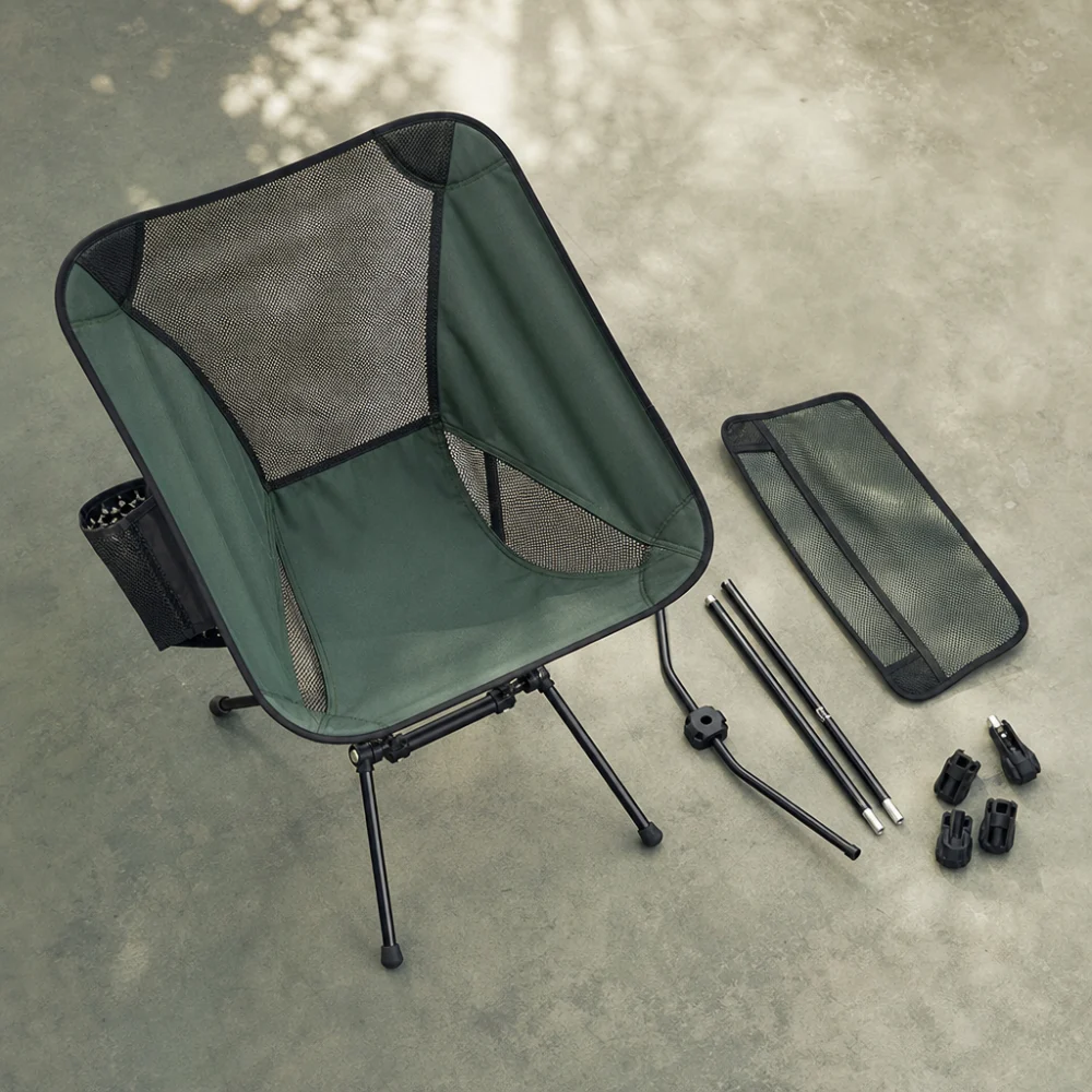 Generic camp chair replacement parts arranged beside a camping chair