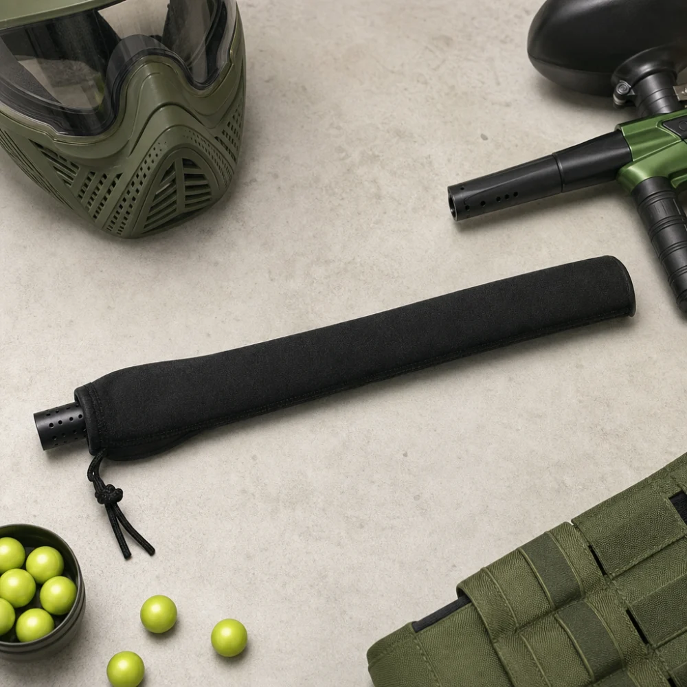 A paintball barrel cover shown with simple paintball gear on a neutral background