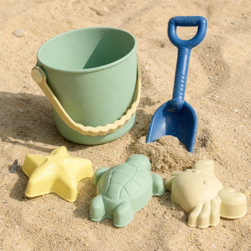 Assorted sand toys arranged on sand