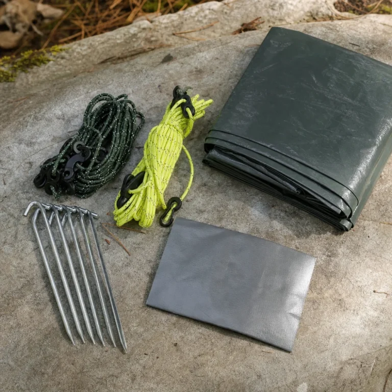 Tent accessory items arranged on a neutral surface